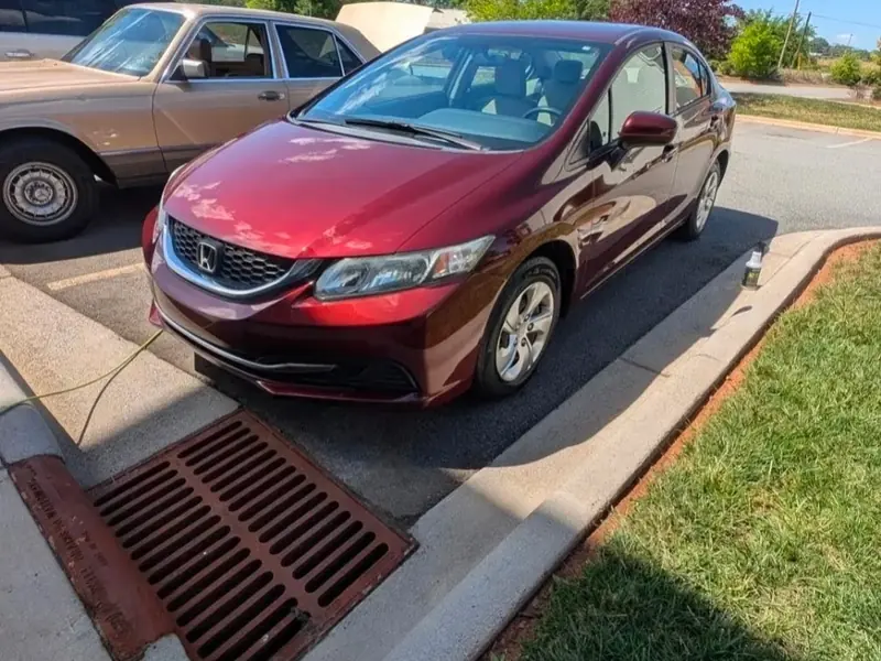 Maroon Honda Civic detailed in Hickory