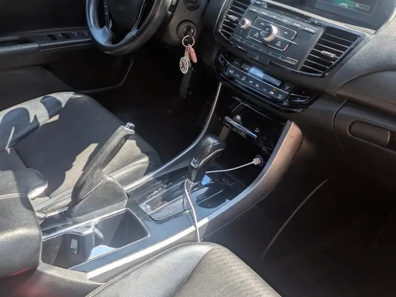 Clean dashboard and center console inside a Honda sedan